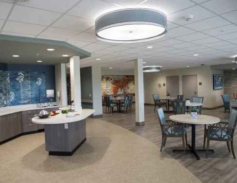 Open common area with café counter and dining tables