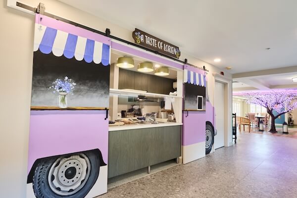 Indoor food-truck style café counter at Lorien Harmony Park
